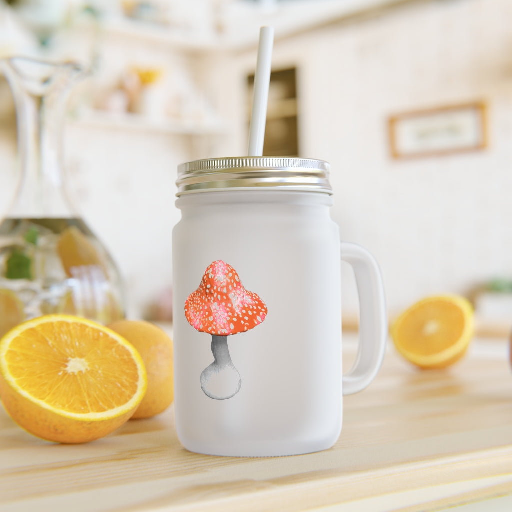 A stylish 16oz Mushroom Mason Jar made of frosted glass, featuring a lid and straw, perfect for personalized drinks.