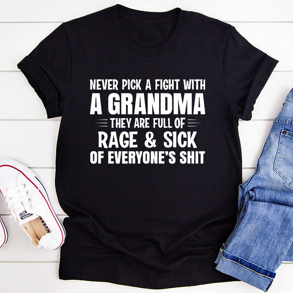 A humorous t-shirt featuring the phrase 'Never Pick A Fight With A Grandma', made from soft cotton with double stitching for durability.