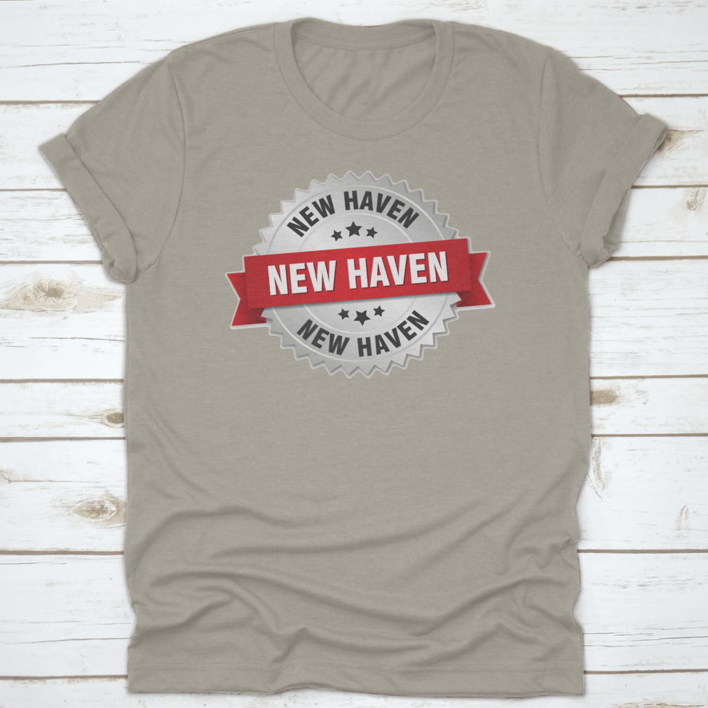 New Haven Round Silver Badge featuring a red ribbon vector graphic design on a stylish apparel piece.