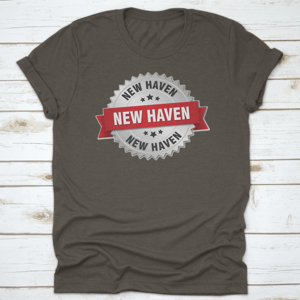 New Haven Round Silver Badge featuring a red ribbon vector graphic design on a stylish apparel piece.