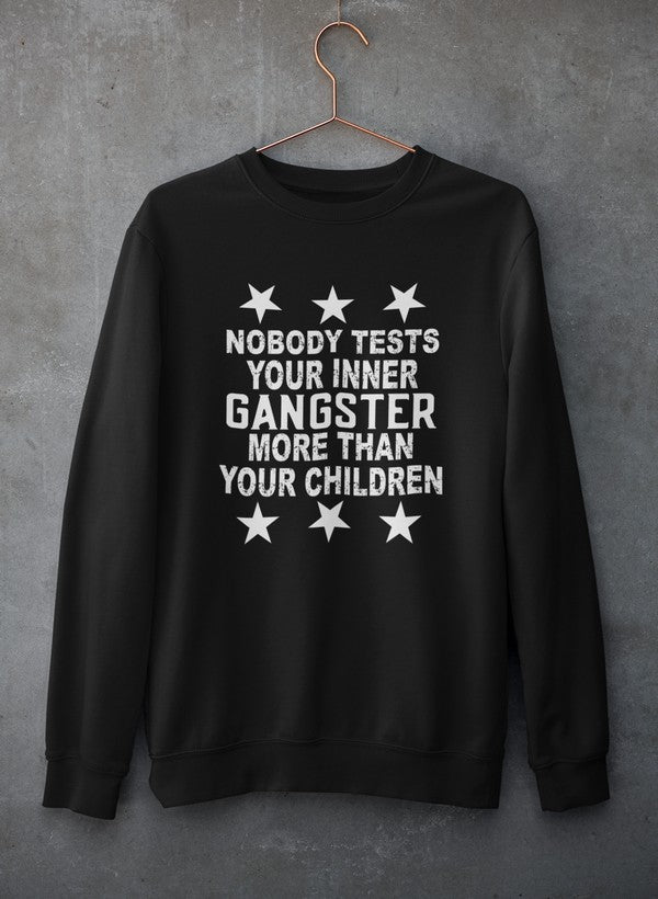 Cozy sweatshirt featuring the phrase 'Nobody Test Your Inner Gangster More Than Your Children', made from cotton/poly fleece blend.