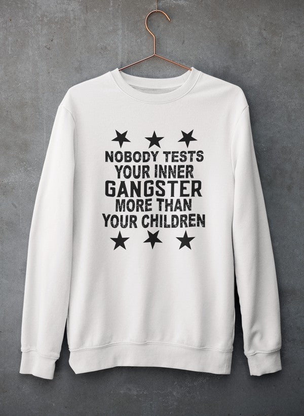 Cozy sweatshirt featuring the phrase 'Nobody Test Your Inner Gangster More Than Your Children', made from cotton/poly fleece blend.