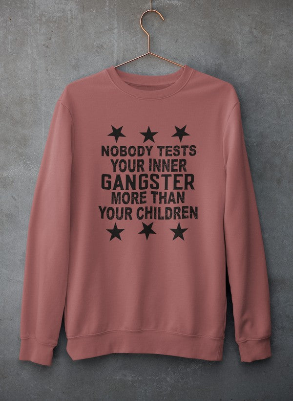 Cozy sweatshirt featuring the phrase 'Nobody Test Your Inner Gangster More Than Your Children', made from cotton/poly fleece blend.