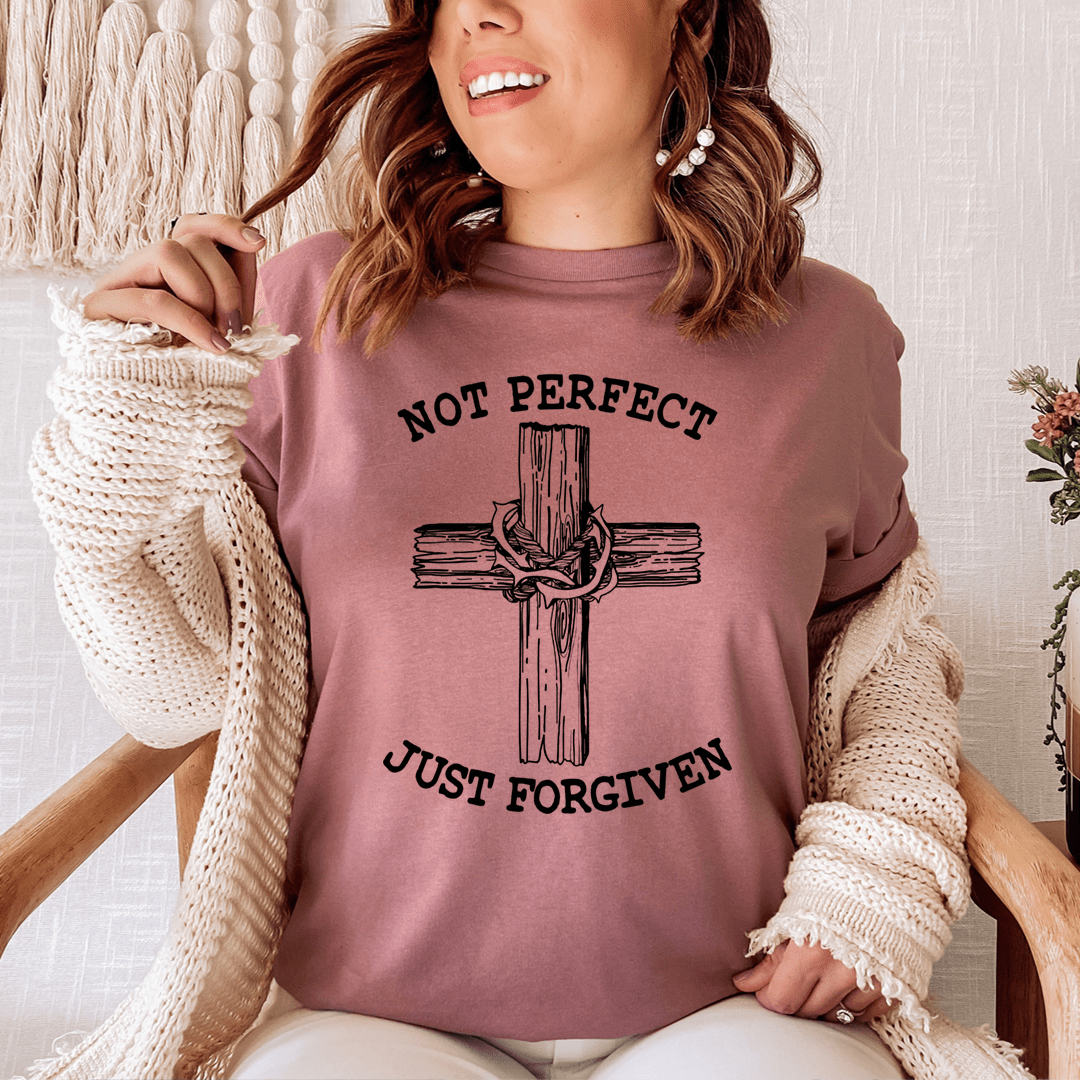 Not Perfect Just Forgiven T-Shirt displayed on a mannequin, showcasing its soft cotton fabric and double-stitched neckline.