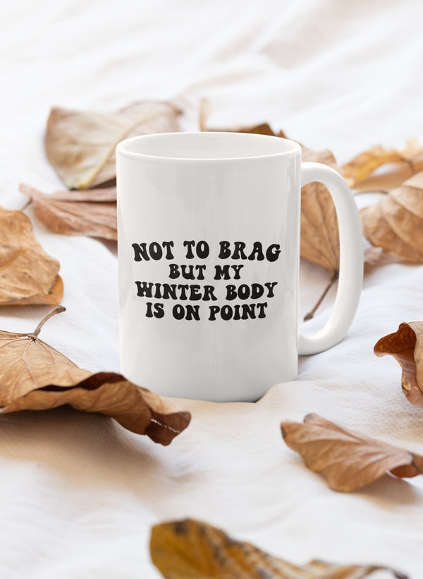 A stylish 11oz winter mug with a glossy finish and sturdy handle, perfect for hot beverages.