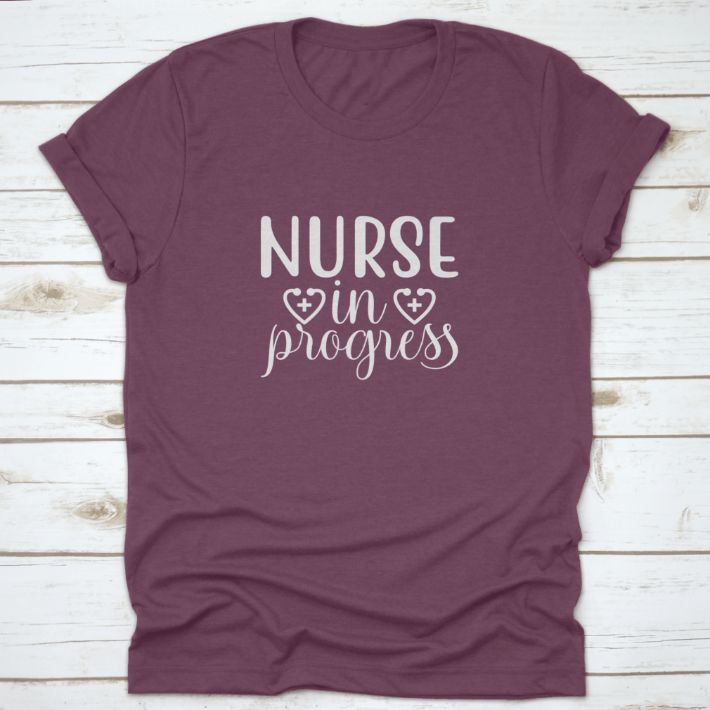 Nurse In Progress Vector Shirt design featuring a classic fit and made from 100% cotton, ideal for nursing professionals.