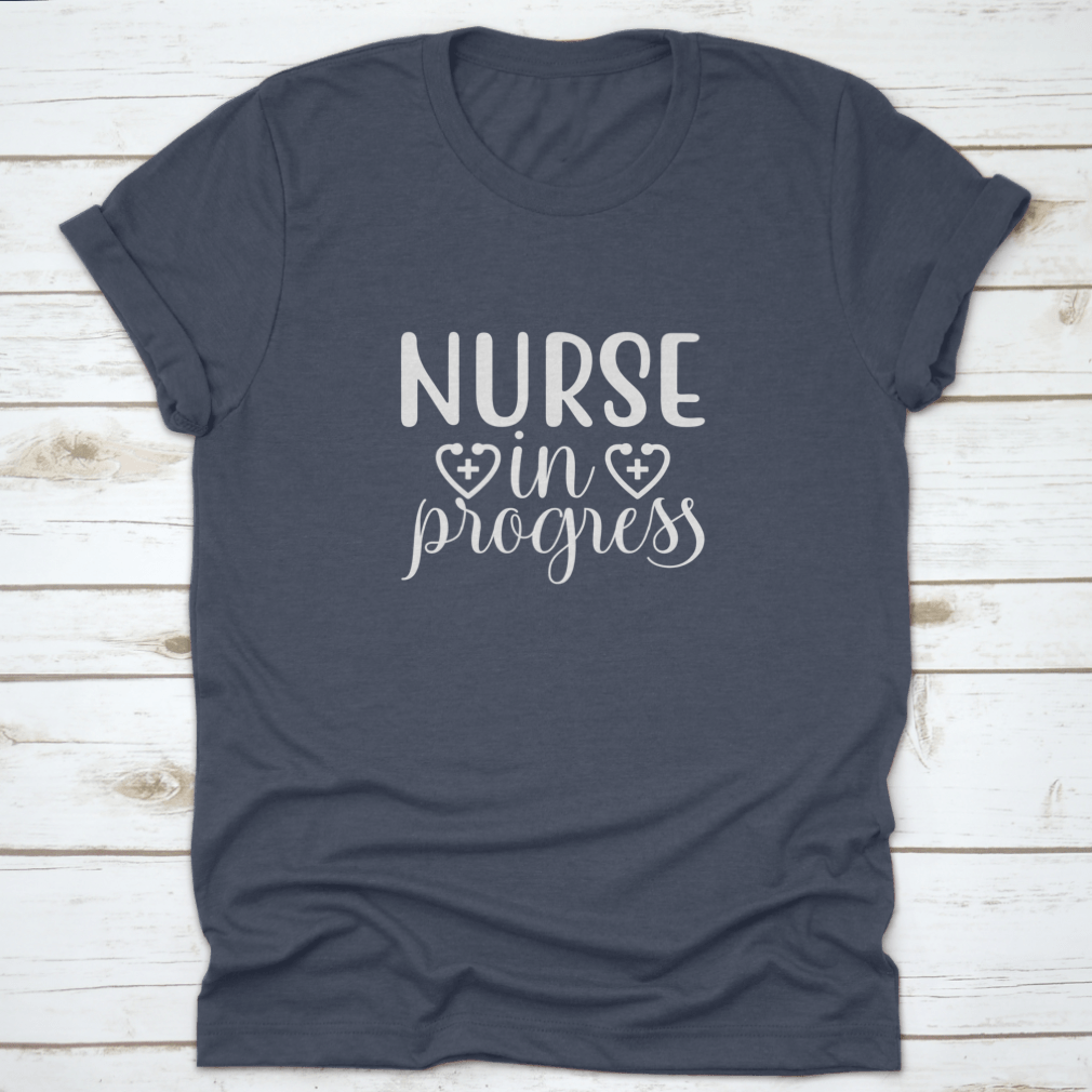 Nurse In Progress Vector Shirt design featuring a classic fit and made from 100% cotton, ideal for nursing professionals.