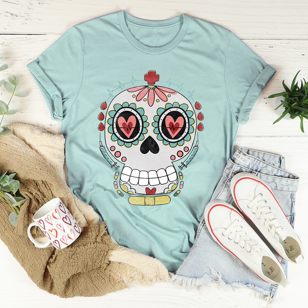 Nurse Sugar Skull T-Shirt featuring vibrant sugar skull design on soft cotton fabric, perfect for nurses and art lovers.