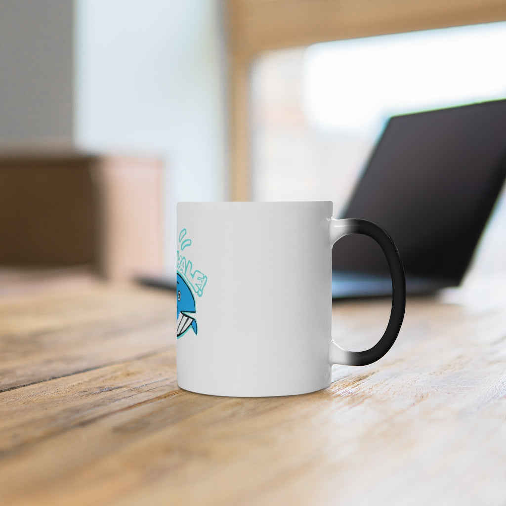 Oh Whale Color Changing Mug showcasing its whimsical design and color-changing feature when filled with hot liquid.