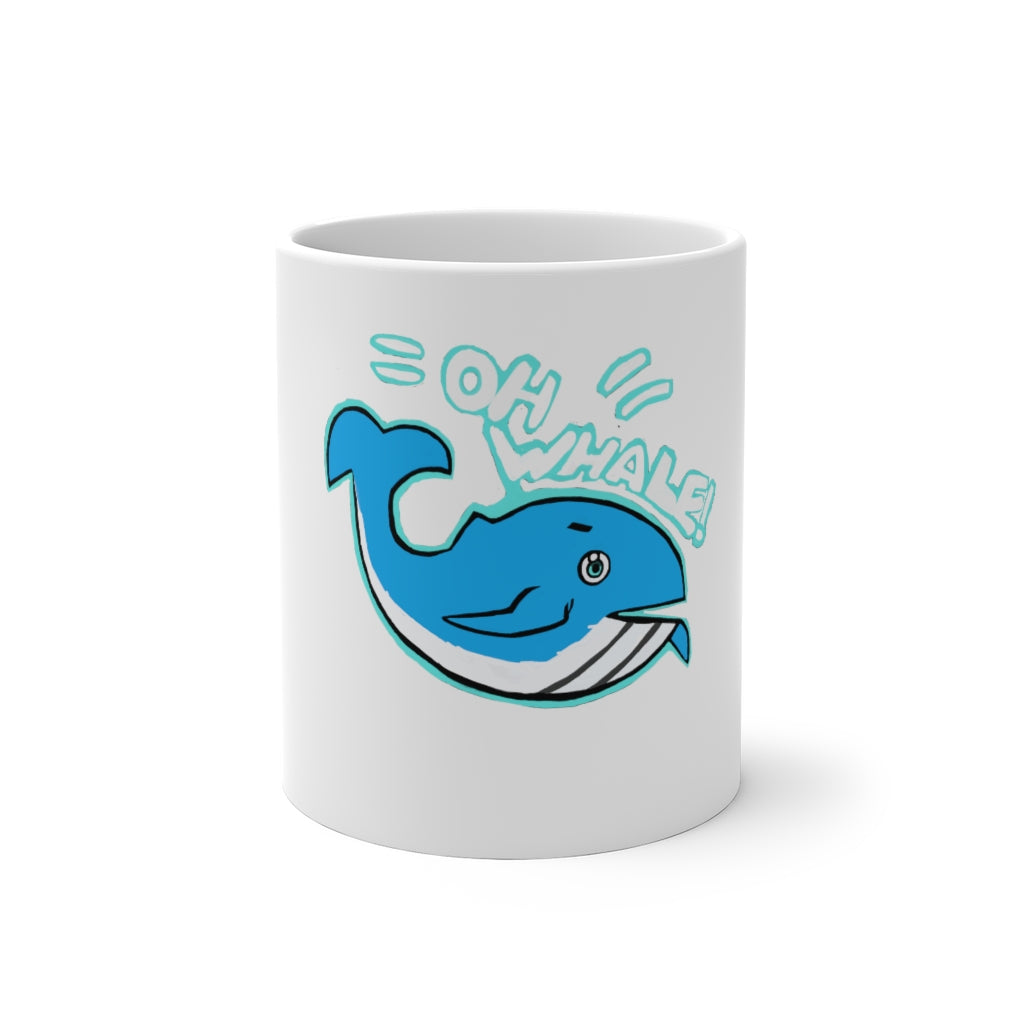 Oh Whale Color Changing Mug showcasing its whimsical design and color-changing feature when filled with hot liquid.