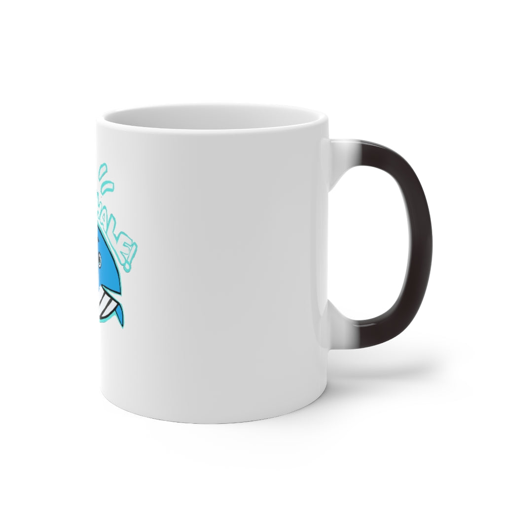 Oh Whale Color Changing Mug showcasing its whimsical design and color-changing feature when filled with hot liquid.