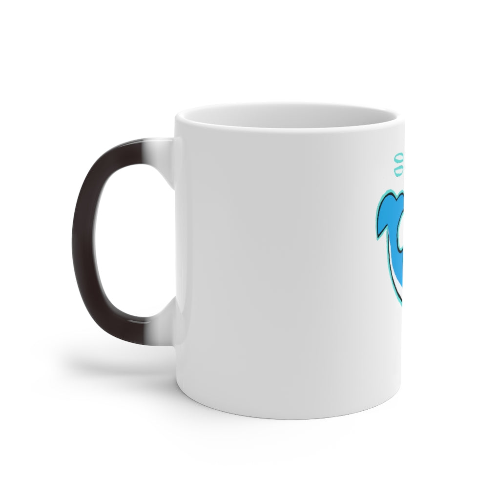 Oh Whale Color Changing Mug showcasing its whimsical design and color-changing feature when filled with hot liquid.