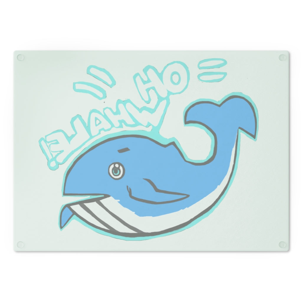 Oh Whale Cutting Board made of tempered glass with a charming whale design and rubber dots for stability.