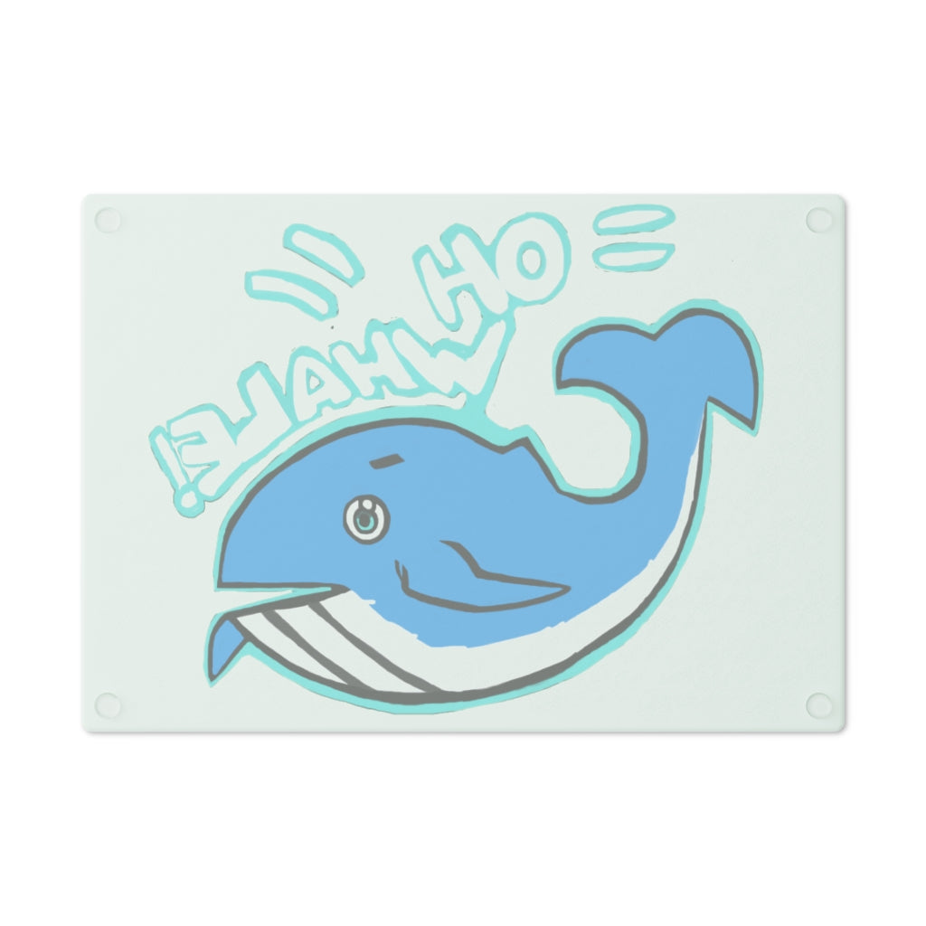 Oh Whale Cutting Board made of tempered glass with a charming whale design and rubber dots for stability.