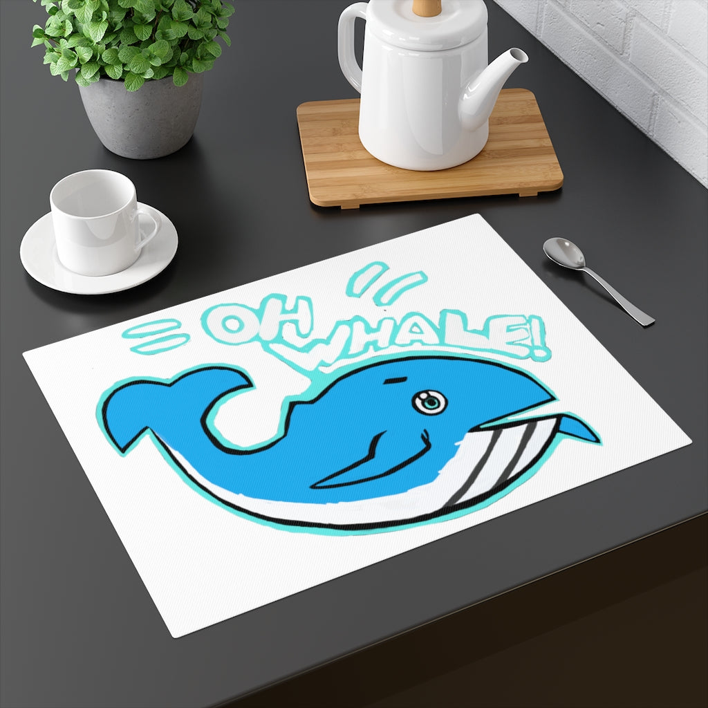 Oh Whale Placemat featuring a playful whale design on one side and a natural back, made from durable cotton.