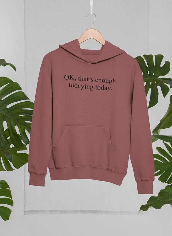 A stylish hoodie featuring the phrase 'OK That's Enough Todaying Today', designed by top artists, showcasing a cozy cotton/poly fleece blend.