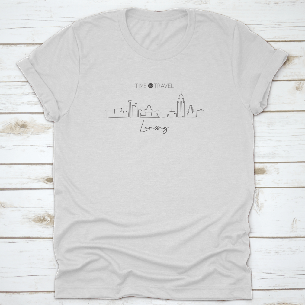 A stylish cotton t-shirt featuring a minimalist one continuous line drawing of the Lansing City Skyline, Michigan, showcasing its iconic buildings.