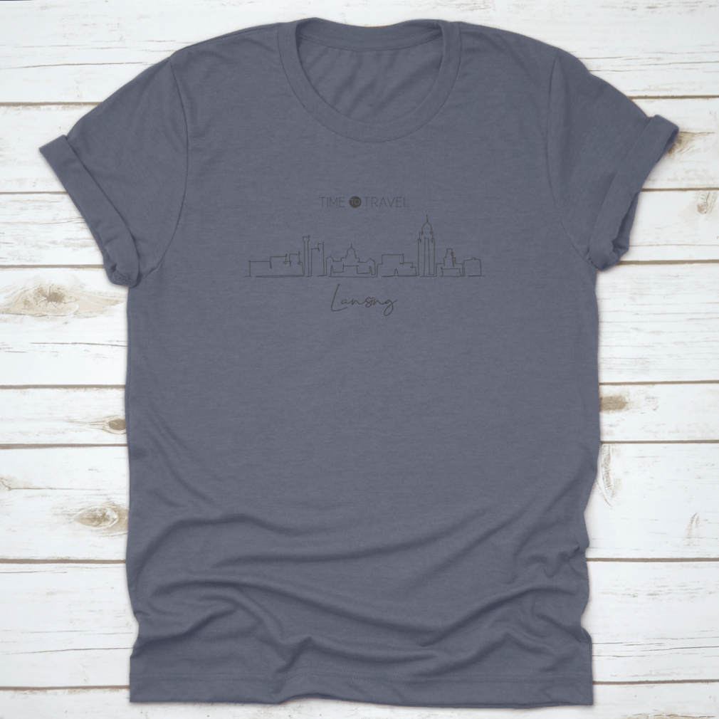 A stylish cotton t-shirt featuring a minimalist one continuous line drawing of the Lansing City Skyline, Michigan, showcasing its iconic buildings.