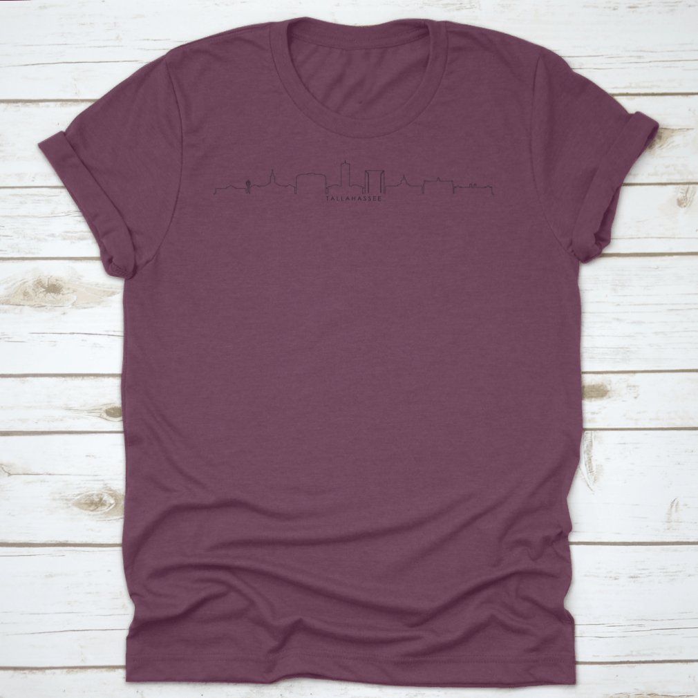 A stylish T-shirt featuring a continuous line design of the Tallahassee Florida skyline, showcasing iconic buildings and landmarks.