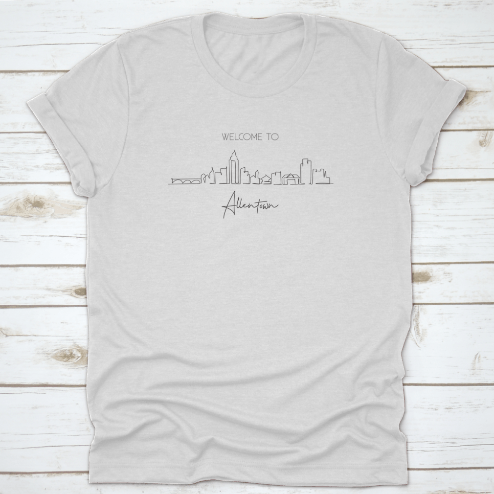 A stylish T-shirt featuring a minimalist single line drawing of the Allentown City Skyline in Pennsylvania.