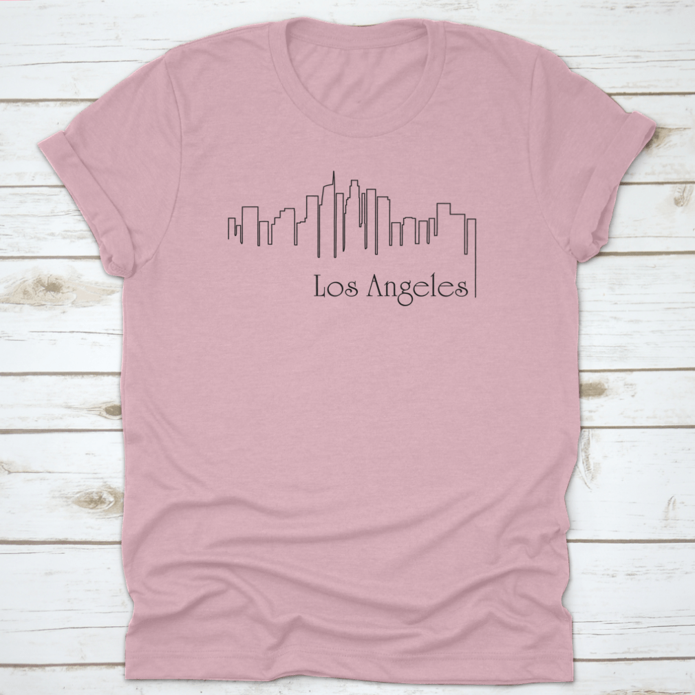 A stylish t-shirt featuring a one-line illustration of Los Angeles with an abstract background, showcasing a modern and artistic design.