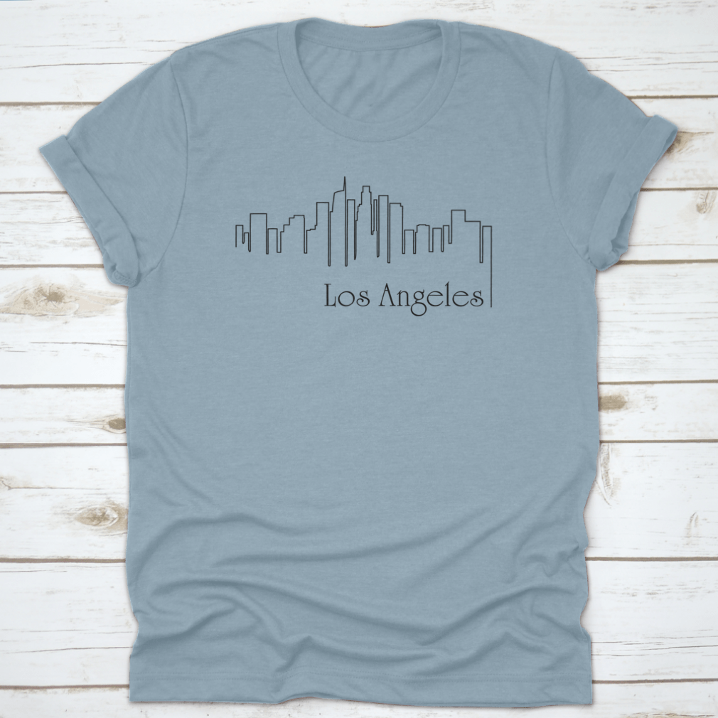 A stylish t-shirt featuring a one-line illustration of Los Angeles with an abstract background, showcasing a modern and artistic design.