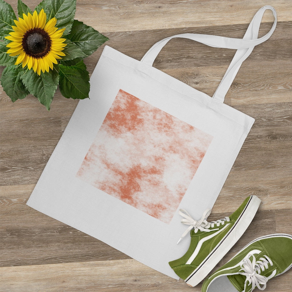 Orange Clouds Tote Bag featuring a vibrant cloud design and long cross-stitched handles, made from 100% cotton fabric.