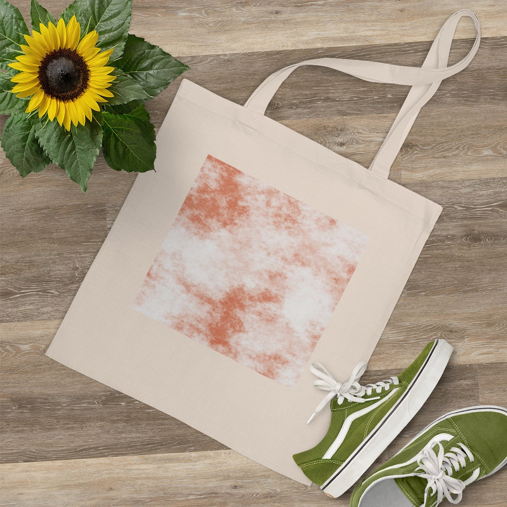 Orange Clouds Tote Bag featuring a vibrant cloud design and long cross-stitched handles, made from 100% cotton fabric.