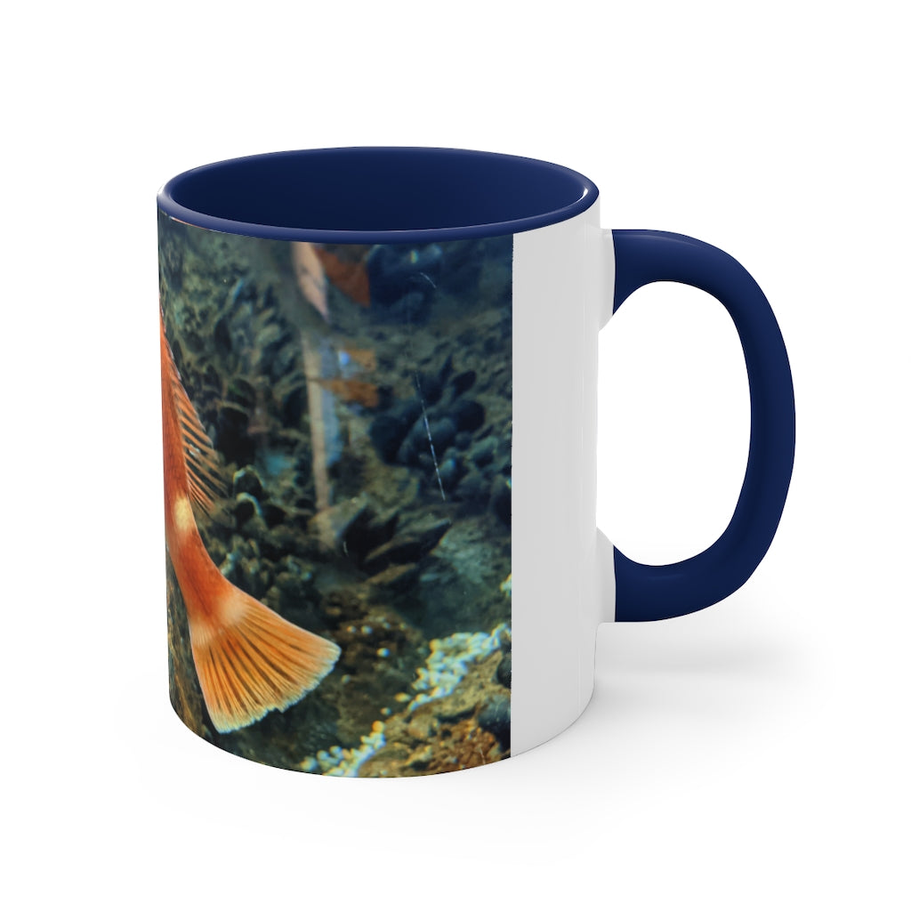 Orange Fish Accent Coffee Mug with a vibrant orange interior and handle, featuring a comfortable C-handle design.