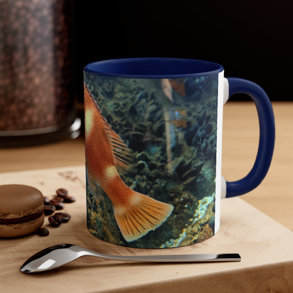 Orange Fish Accent Coffee Mug with a vibrant orange interior and handle, featuring a comfortable C-handle design.