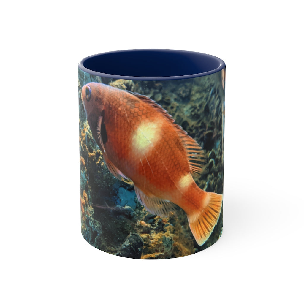 Orange Fish Accent Coffee Mug with a vibrant orange interior and handle, featuring a comfortable C-handle design.