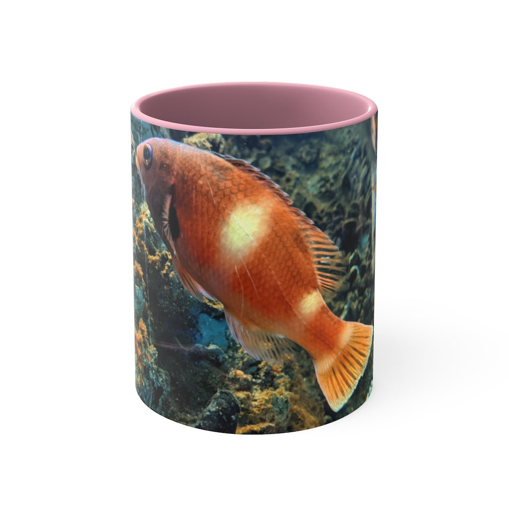 Orange Fish Accent Coffee Mug with a vibrant orange interior and handle, featuring a comfortable C-handle design.