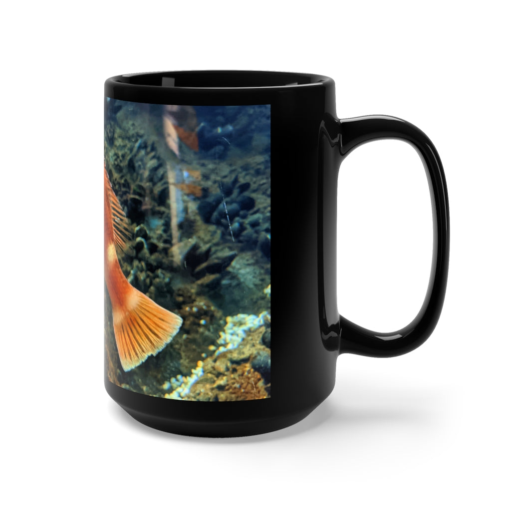 A stylish black ceramic mug with an orange fish design, holding 15 ounces of liquid, perfect for coffee and tea lovers.