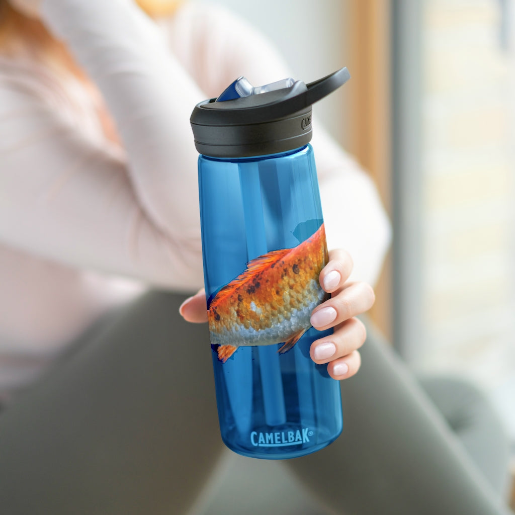 Orange Fish CamelBak Eddy® Water Bottle in 20oz and 25oz sizes, showcasing its robust design and spill-proof biting valve.