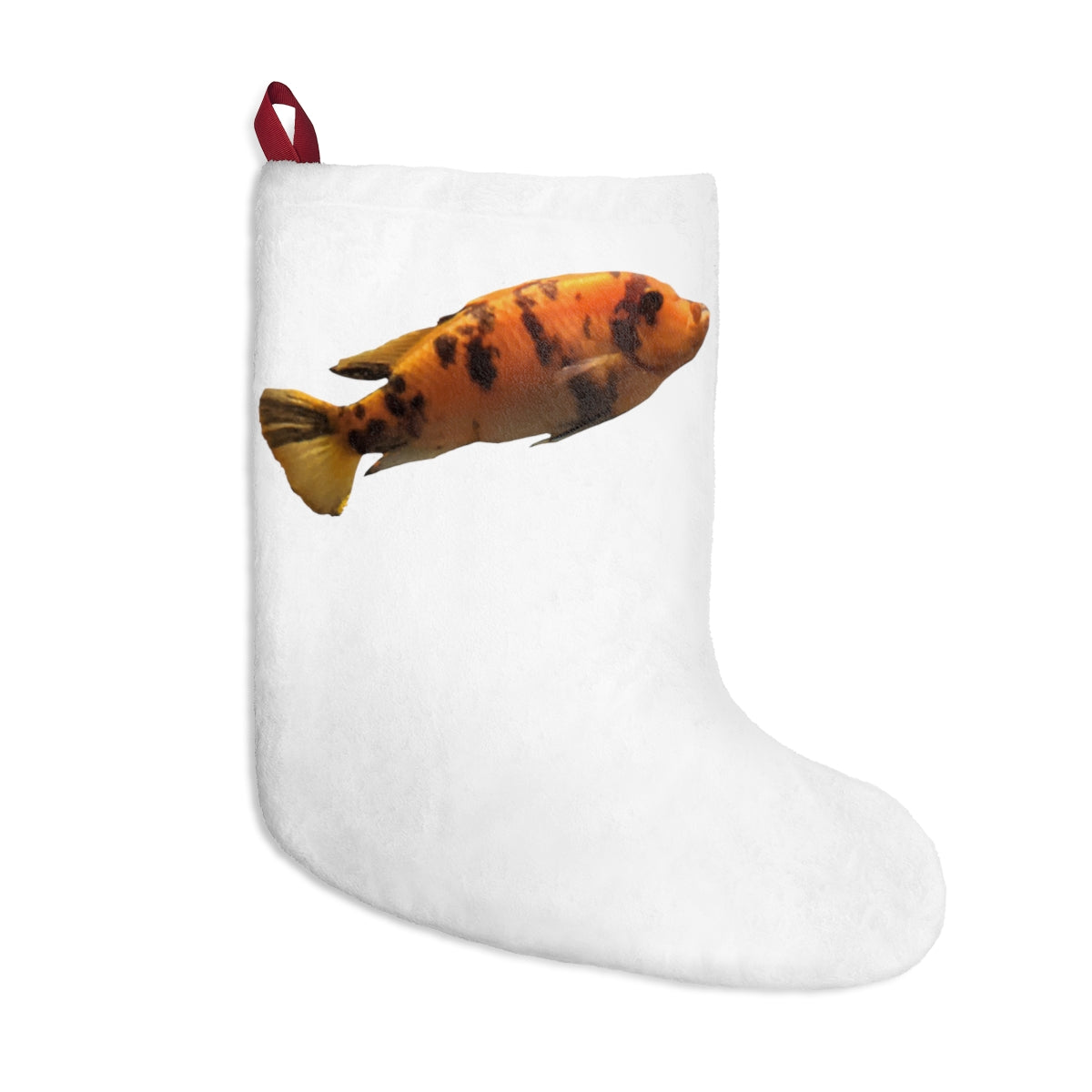 Vibrant orange fish Christmas stocking hanging by a fireplace, showcasing a festive design and personalized options.