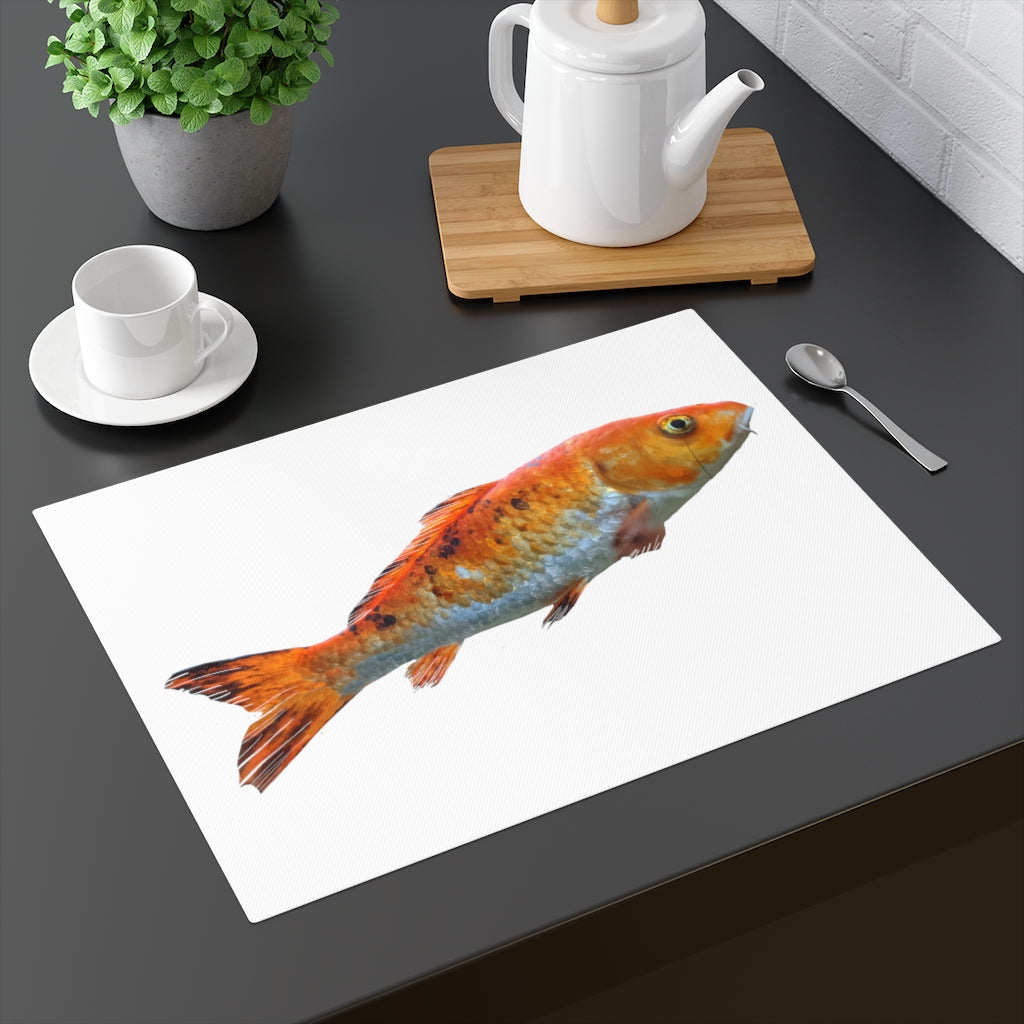 Orange Fish Placemat featuring a vibrant fish design on one side and natural cotton on the reverse, perfect for dining tables.