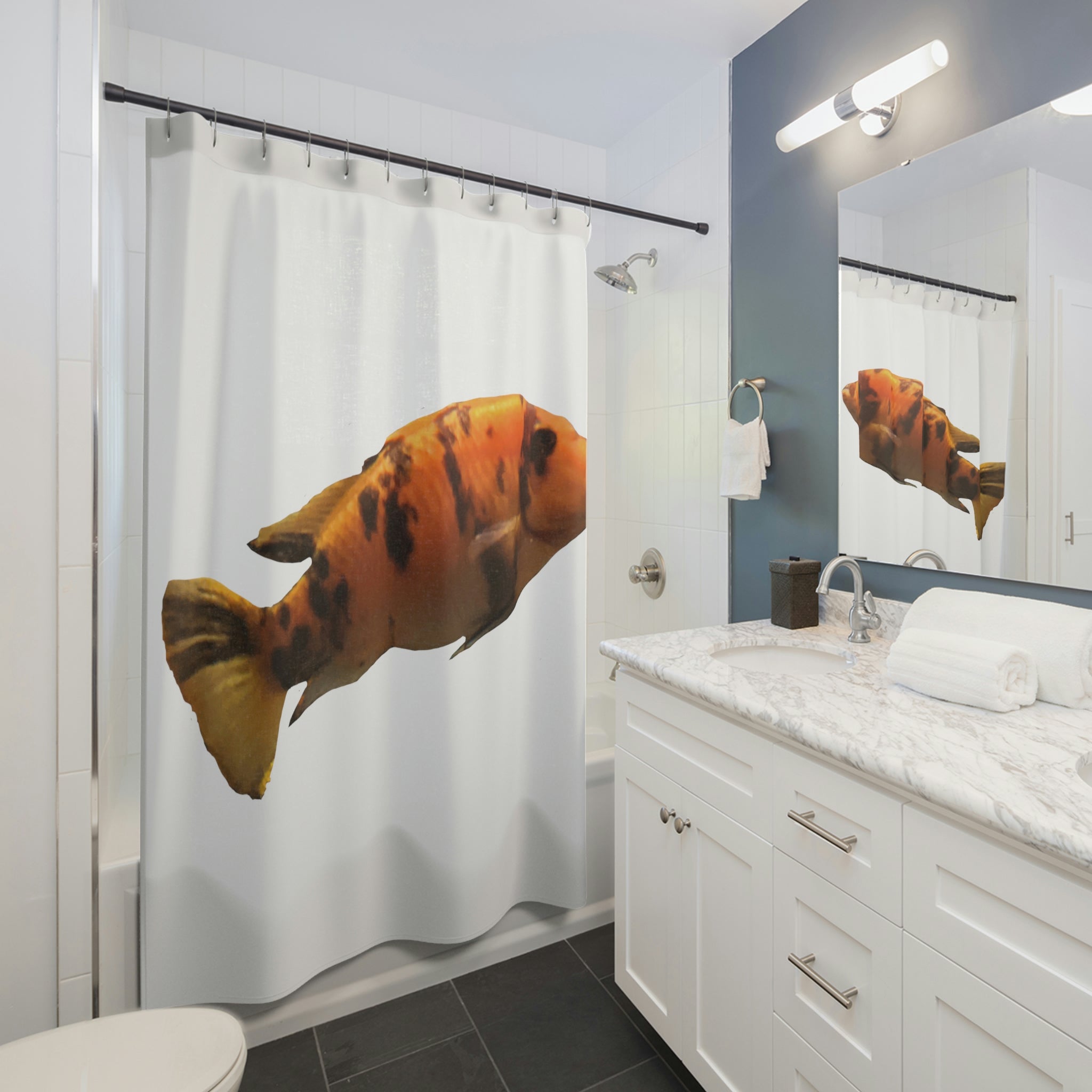 Vibrant orange fish shower curtain hanging in a bathroom, showcasing colorful marine life design.