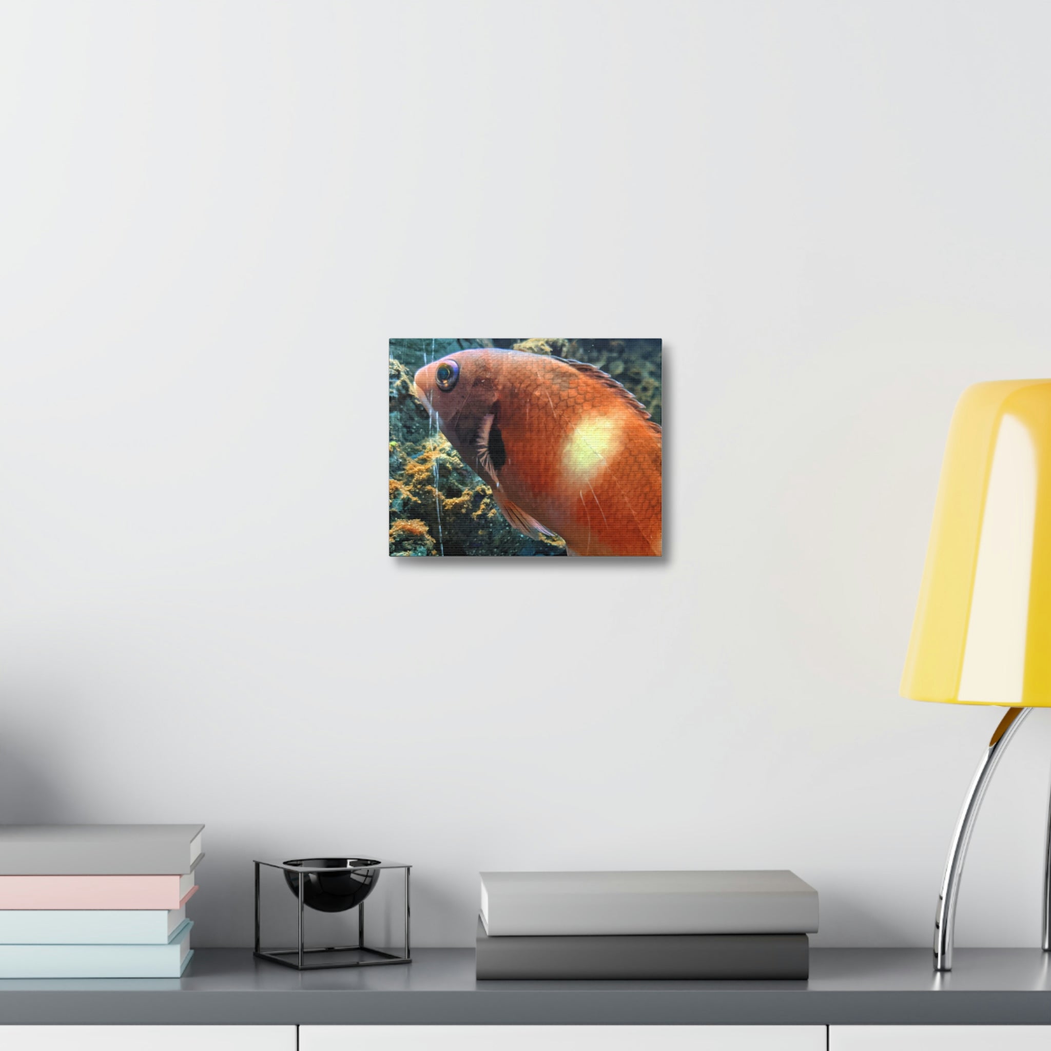 Vibrant orange fish artwork printed on premium stretched canvas, framed with durable wooden edges, perfect for indoor decoration.