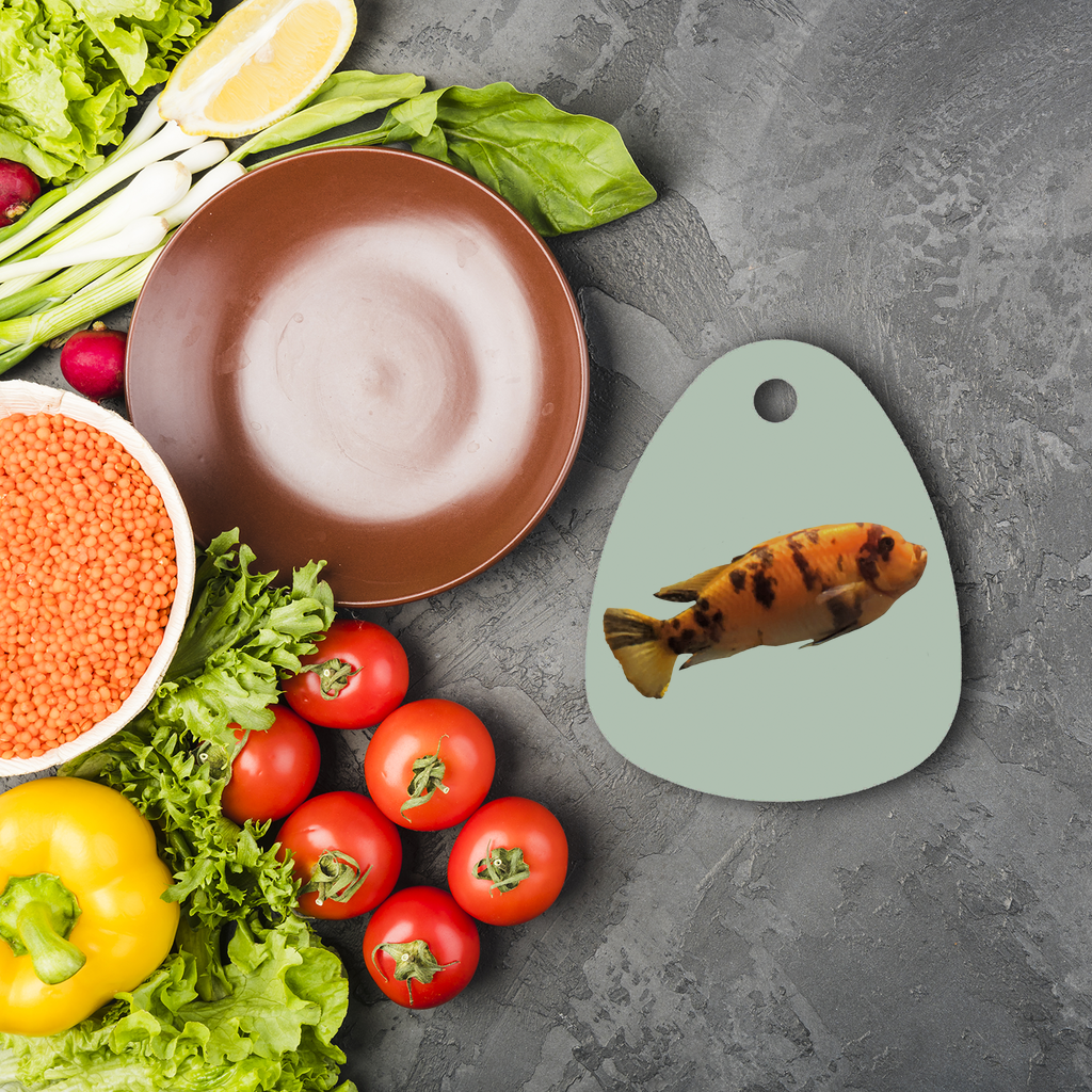 Orange Fish Sublimation Glass Cutting Board with a round shape, featuring a vibrant orange fish design, ideal for custom artwork.