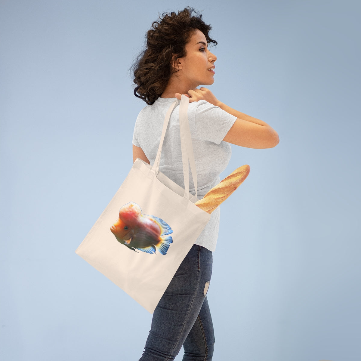 Orange Fish Tote Bag with long handles and cross-stitched design, made from 100% cotton fabric.