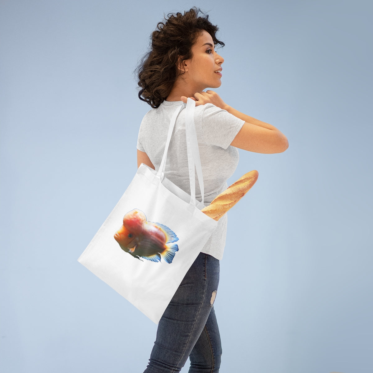 Orange Fish Tote Bag with long handles and cross-stitched design, made from 100% cotton fabric.