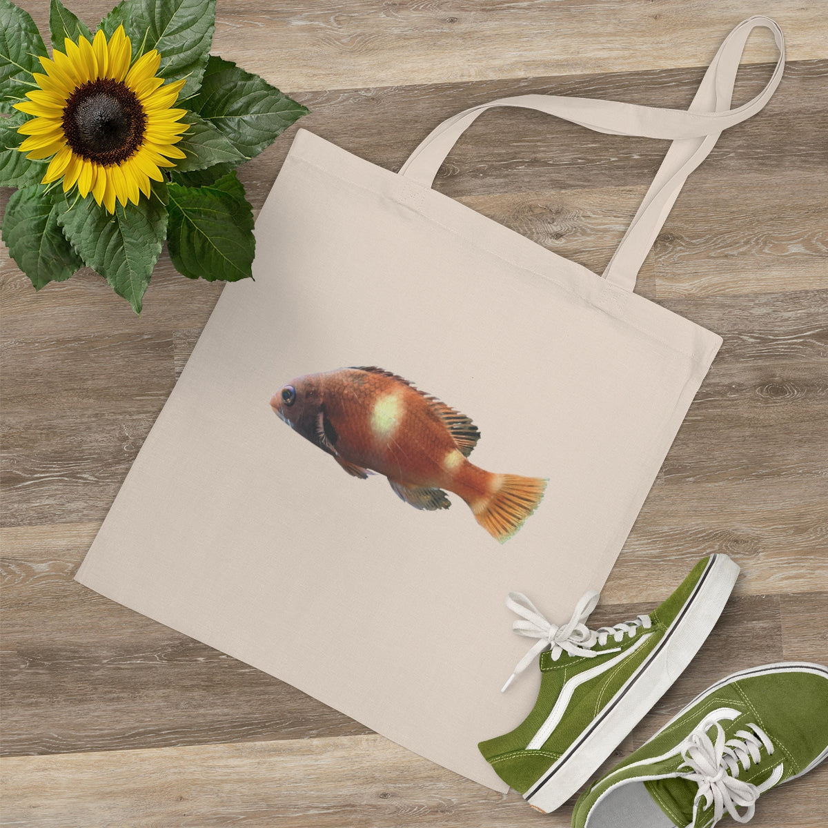 Orange Fish Tote Bag made of 100% cotton with cross-stitched handles, perfect for everyday use.