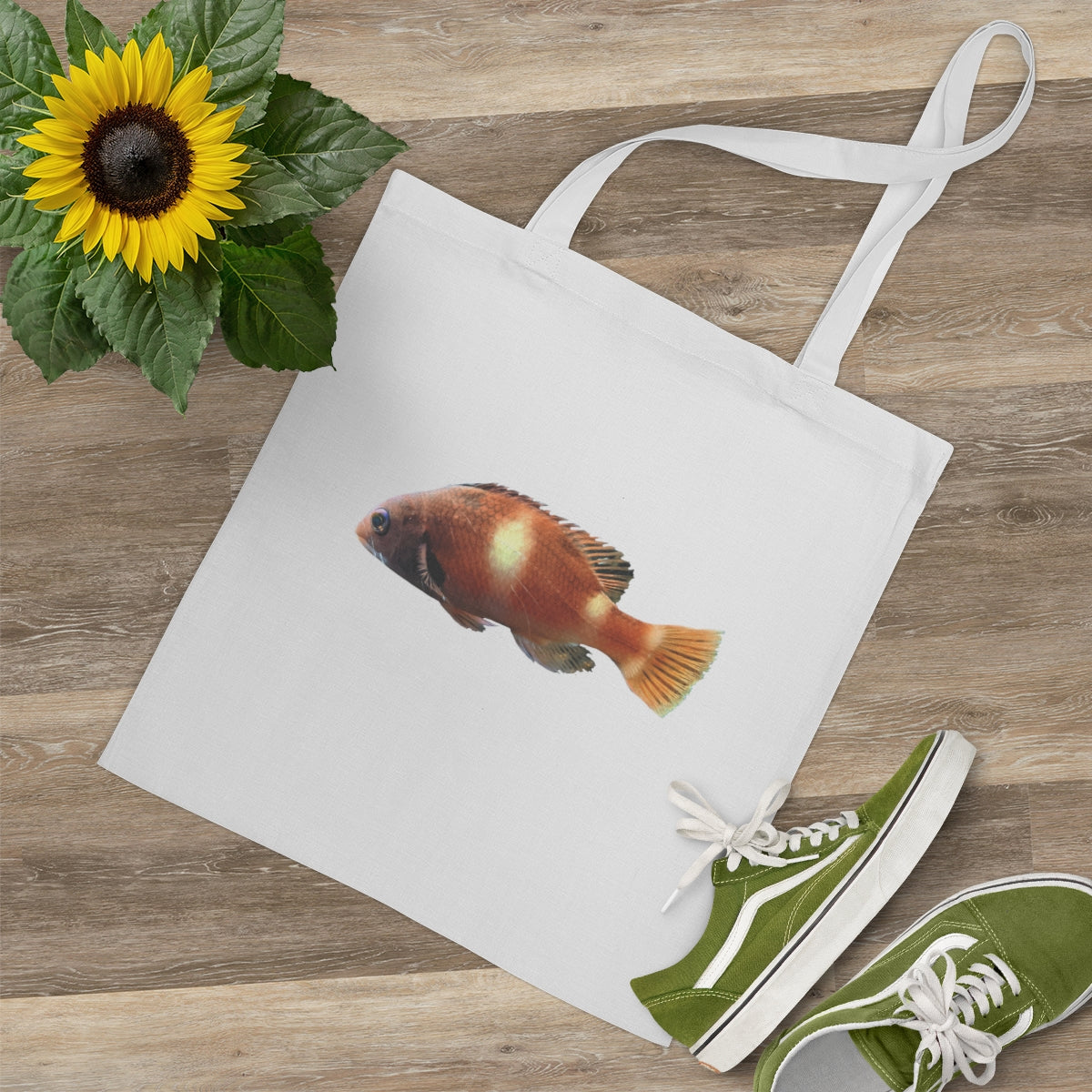 Orange Fish Tote Bag made of 100% cotton with cross-stitched handles, perfect for everyday use.