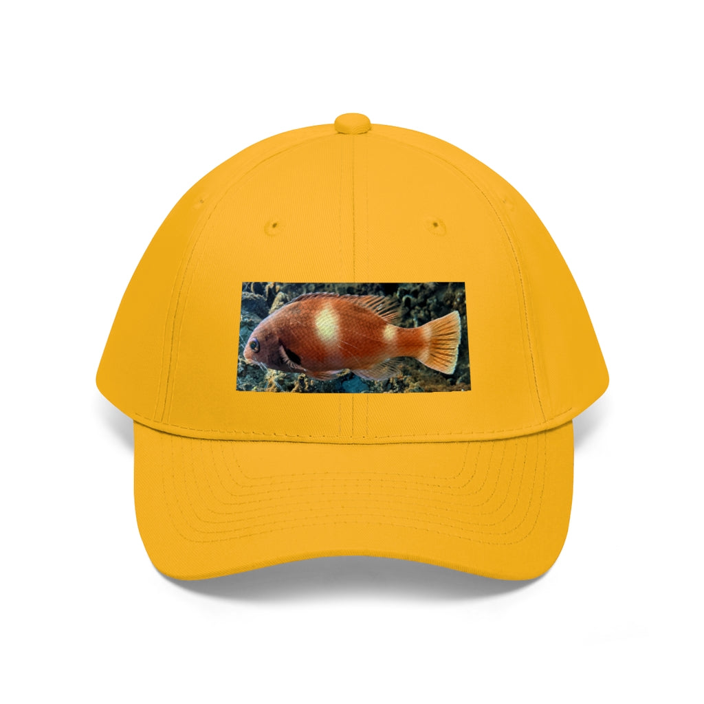 Orange Fish Unisex Twill Hat featuring a classic 6-panel design and adjustable Velcro closure, made from 100% cotton twill.