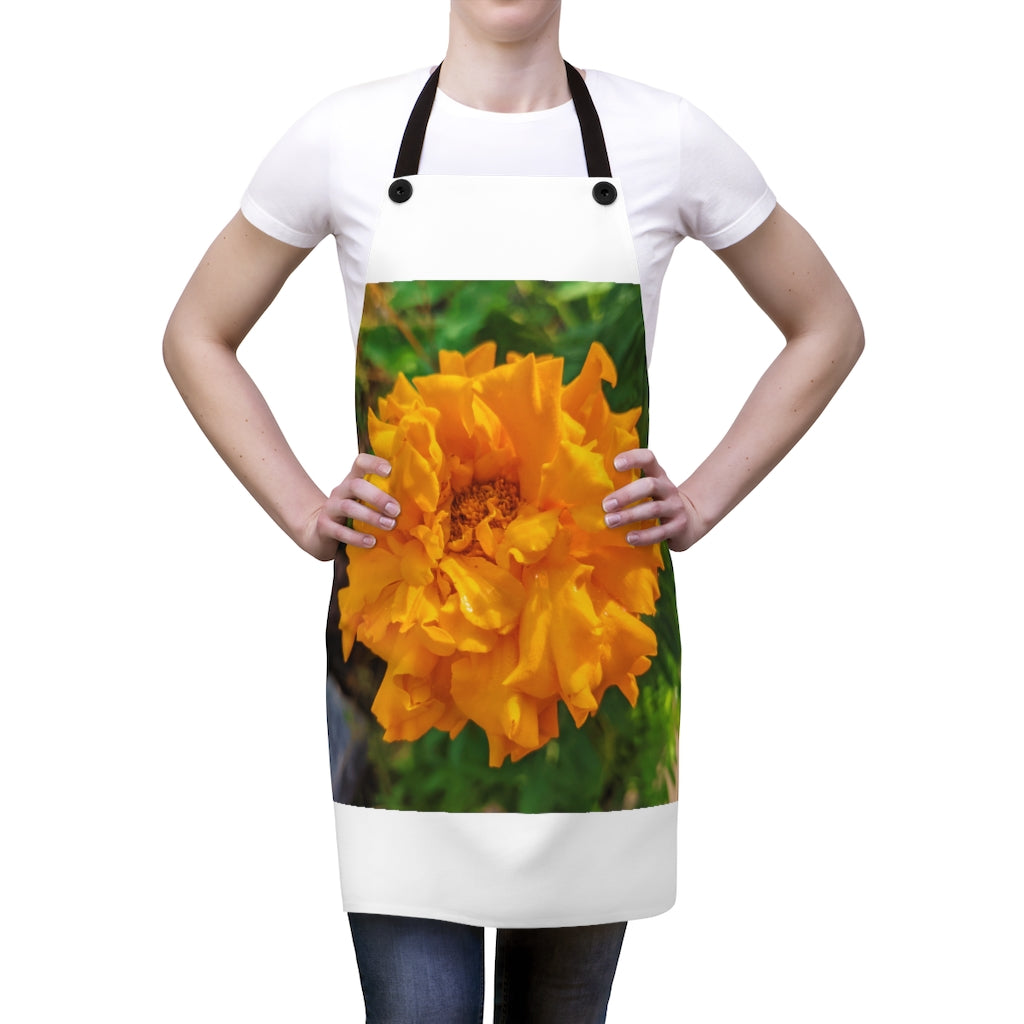 Orange Flower Apron with black detachable twill straps, showcasing a vibrant floral design.