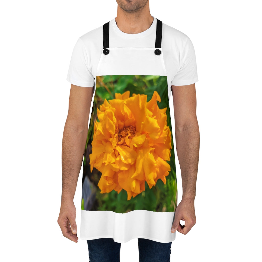 Orange Flower Apron with black detachable twill straps, showcasing a vibrant floral design.