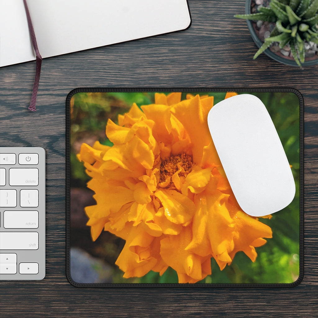 Orange Flower Gaming Mouse Pad featuring vibrant floral design and stitched edges, ideal for gaming and office use.