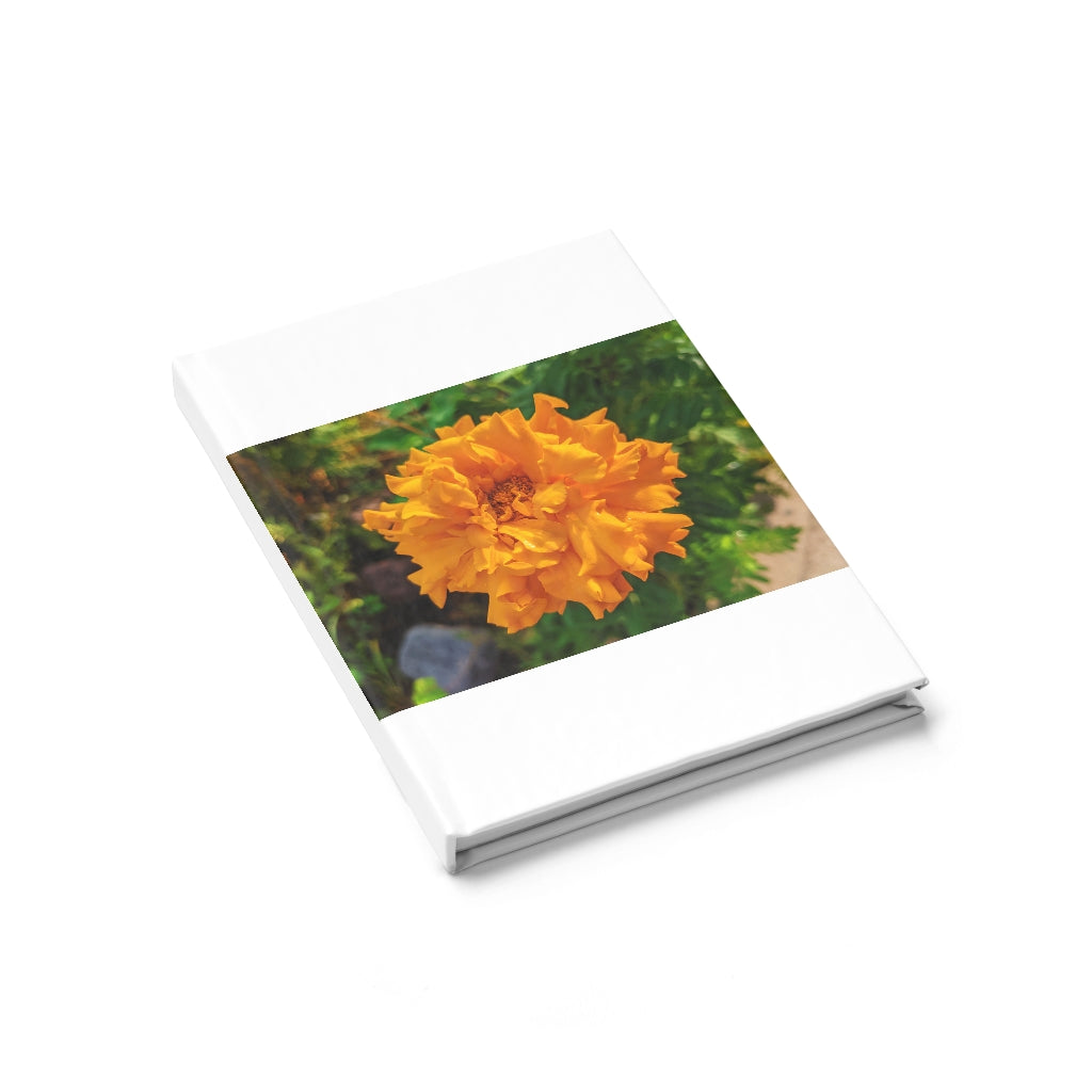 Orange Flower Journal with ruled lines, featuring a vibrant wraparound print and durable hardcover design.