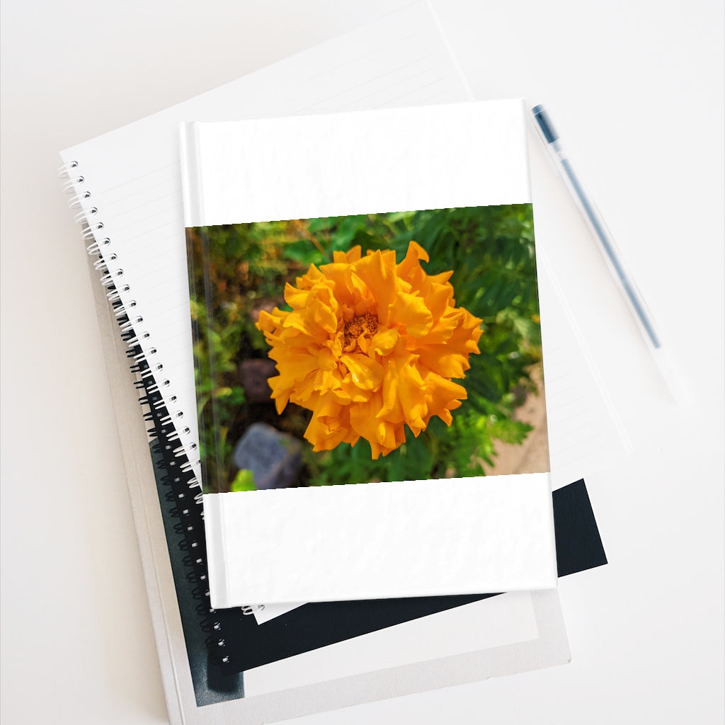 Orange Flower Journal with ruled lines, featuring a vibrant wraparound print and durable hardcover design.