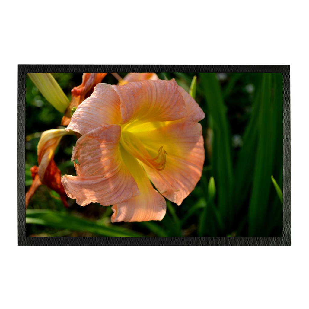 Orange Flower Sublimation Doormat featuring a vibrant floral design on a durable rubber base, perfect for home entryways.